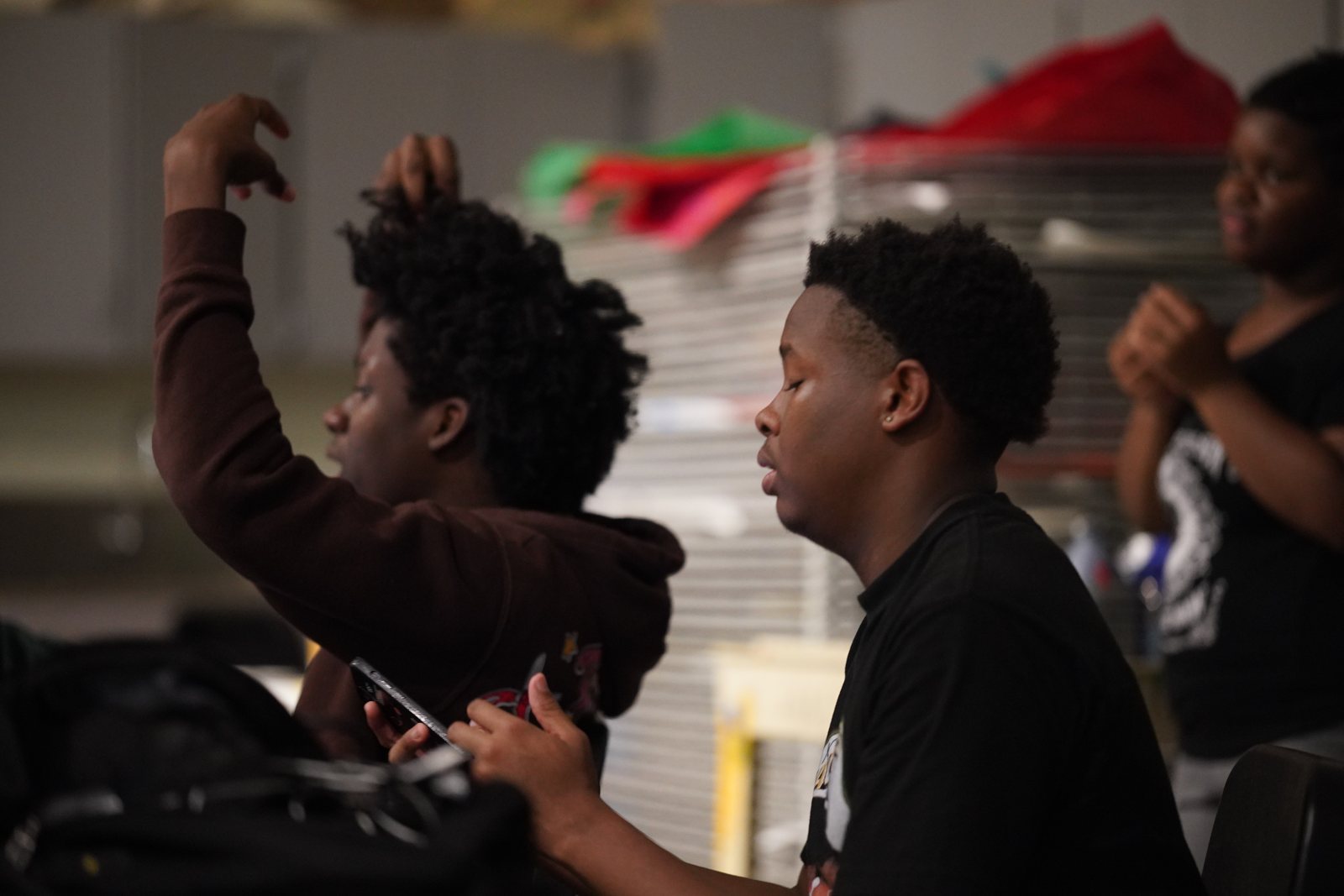 Photography students reviewing their shots
