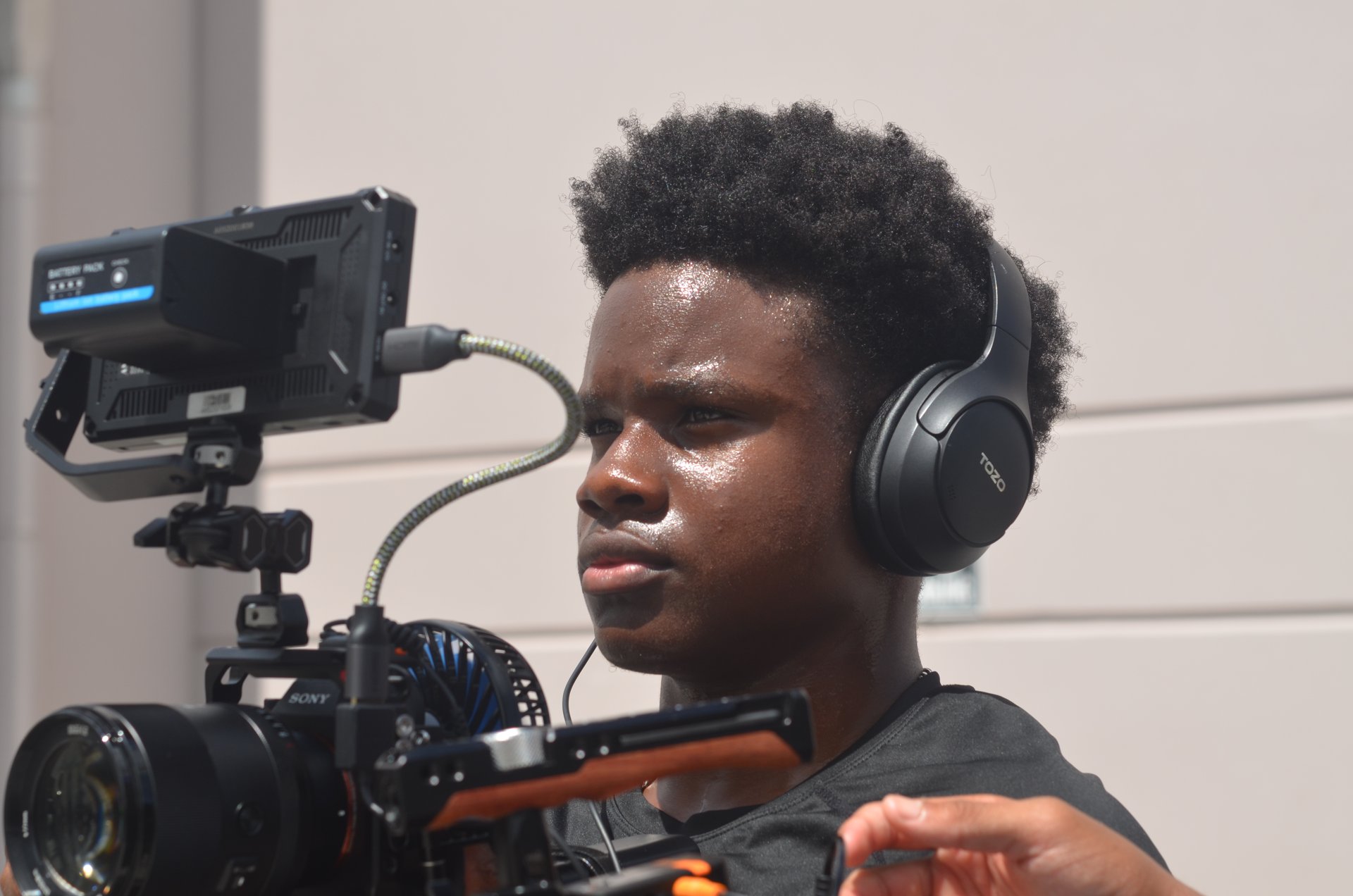 C.R.A.F.T. videography student operating a cinema camera rig